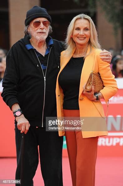 Tomas Milian And Barbara Bouchet Pose On The Red Carpet With The Marc