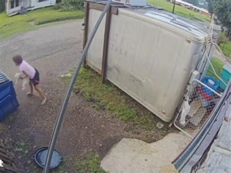 Moment Woman Cruelly Hurls Two Puppies Into Dumpster Caught On Camera