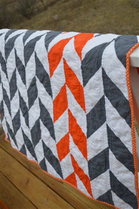 An Orange And Grey Herringbone Quilt Newlywoodwards