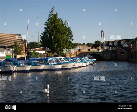 Motor Boats And Cruisers Moored On The River Bure In Wroxham The