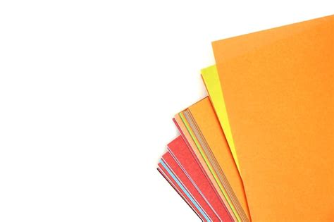 Premium Photo Close Up Of Multi Colored Papers Against White Background