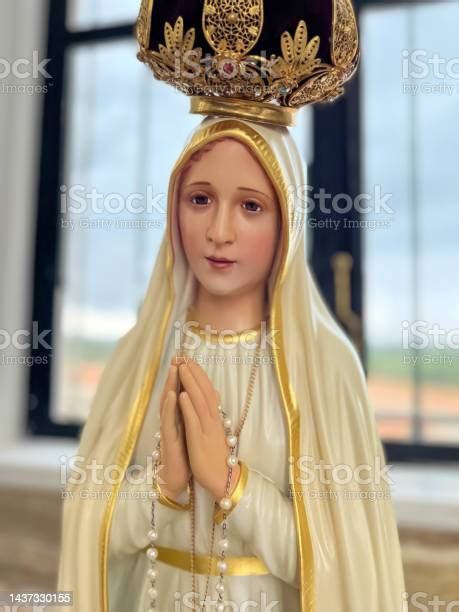 Image Of Our Lady Of Fátima With Folded Hands Stock Photo Download