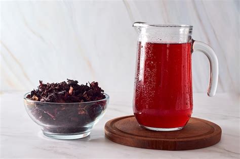 Premium Photo Fresh Hibiscus Or Roselle Water Or Tea Made With