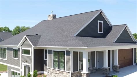 Dark Grey Siding Black Windows White Trim And Natural Light Video