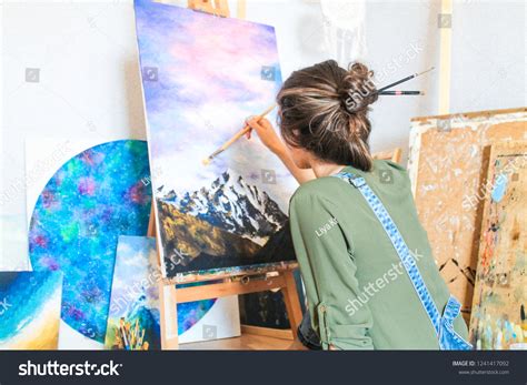 Girl Painting A Picture