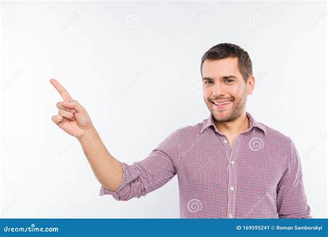 Cheerful Young Man Pointing Away Stock Image Image Of Gesturing