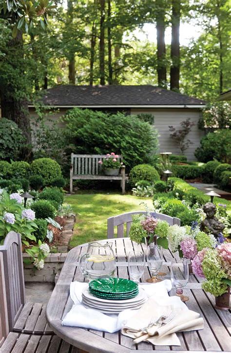 A Garden Adorned With Boxwoods And Hydrangeas Cottage Journal