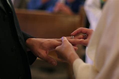 Exchanging Rings At Vow Renewal Ceremony