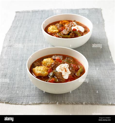 Hungarian Beef Goulash With Sour Cream Stock Photo Alamy