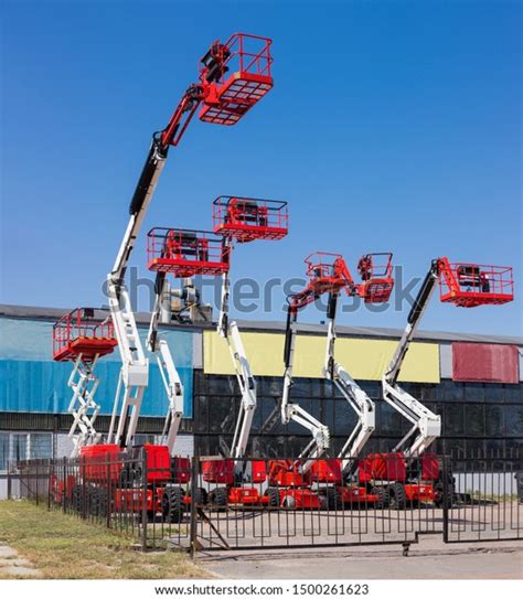 Different Self Propelled Articulated Boom Lifts Stock Photo