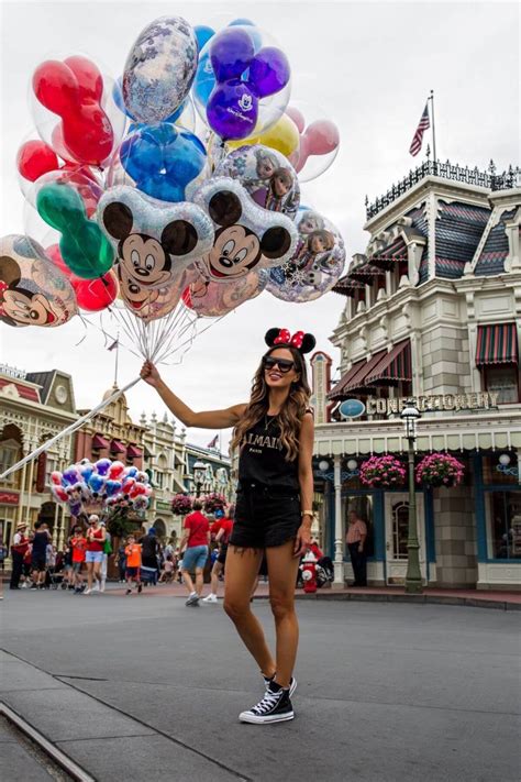 Fashion Blogger Mia Mia Mine Wearing A Casual Outfit At Disney World Disney World Outfits