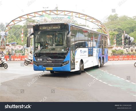 bus passes  road jakarta indonesia stock photo  shutterstock