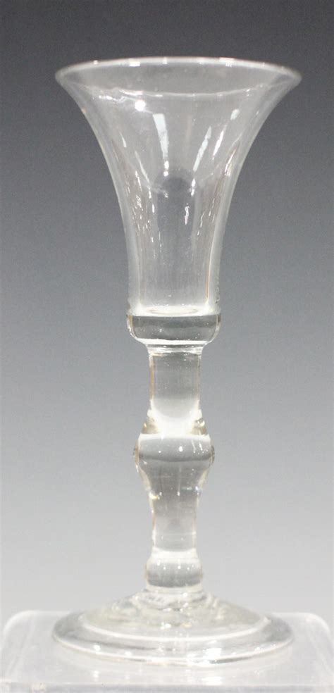 A Balustroid Wine Glass Circa 1750 The Bell Bowl Raised On A Centre