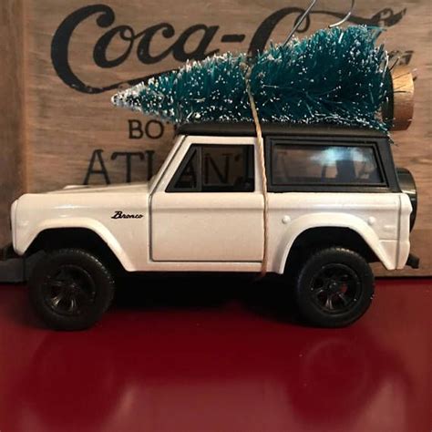 White Ford Bronco Carrying Christmas Tree Ornament Etsy Christmas