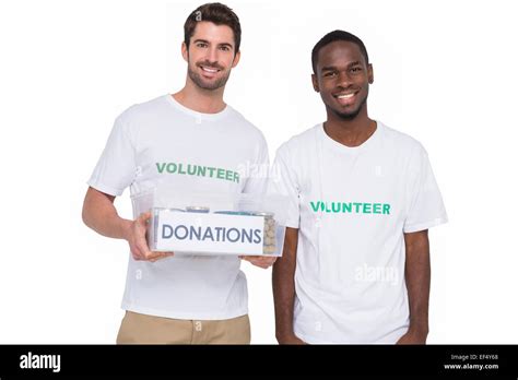 Portrait Of Smiling Men Participating At Charity Stock Photo Alamy