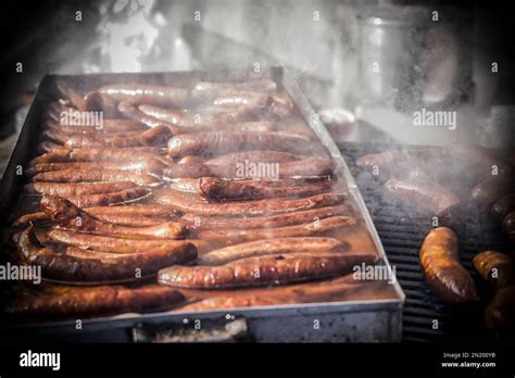 An Outdoor Food Stall Selling Grilled Homemade Sausages Stock Photo Alamy