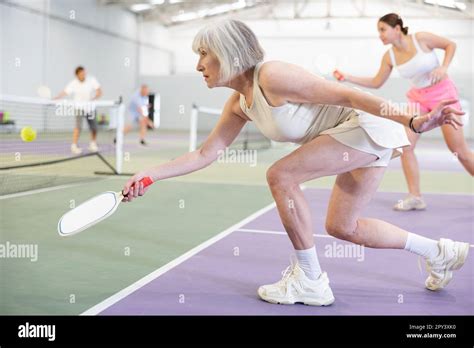 Mature Woman Playing Doubles Pickleball Game Healthy Lifestyle Concept Stock Photo Alamy
