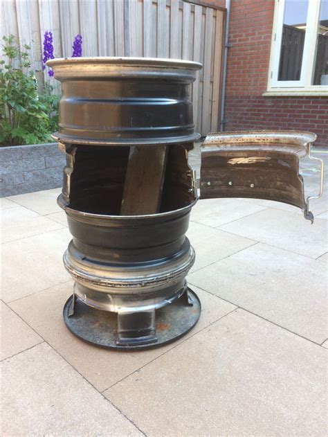 Bbq Made Out Of Car Rims Rim Fire Pit Chiminea Fire Pit Fire Pit