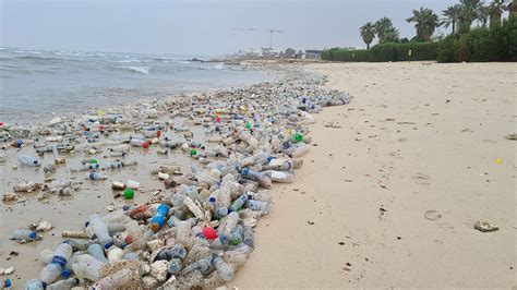 Abu Al Hasaniya Beach Littered With Bottles 248am Entertaining