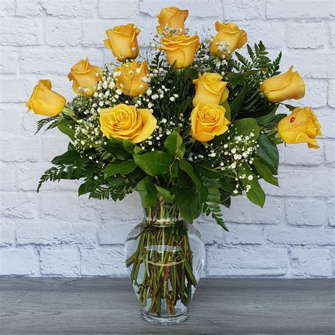 Dozen Long Stemmed Yellow Roses By A Ladybug Floral