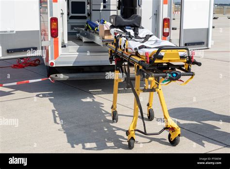 Emergency Stretcher And Ems Ambulance With Open Door Stock Photo Alamy