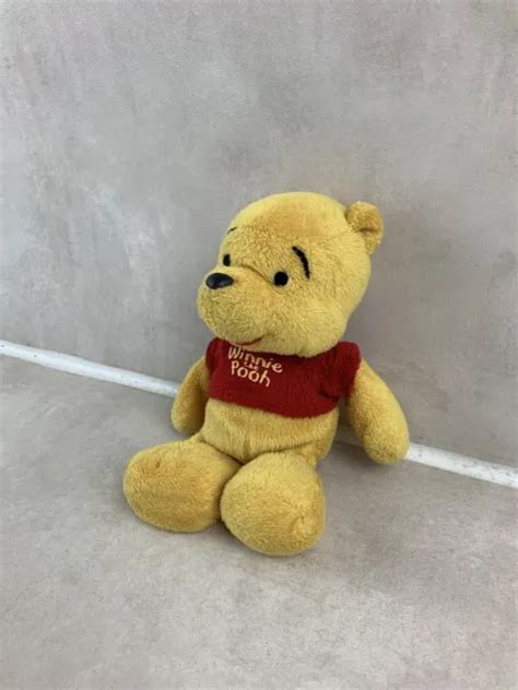 Jolie Peluche Doudou Disney Winnie L Ourson Jaune Et Rouge Eur