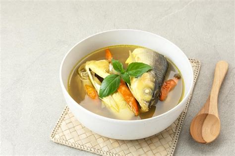 Premium Photo | Pindang serani fish soup with sour and spicy salty ...