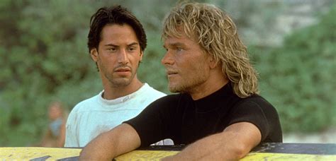 Point Break Writer Explains Why Keanu Reeves Patrick Swayze Reshot