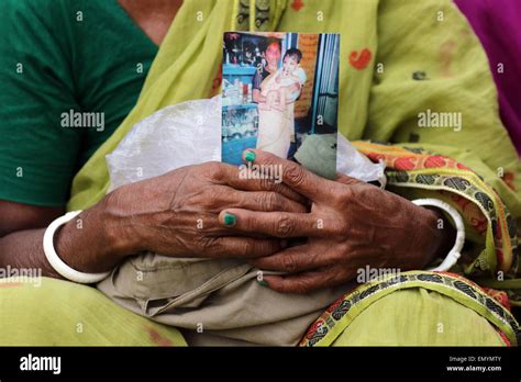 Bangladeshi Relatives Of Victims Of Rana Plaza Cry As They Gather At The Spot On The Second