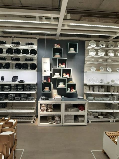 A Room Filled With Lots Of Different Types Of Plates And Bowls On