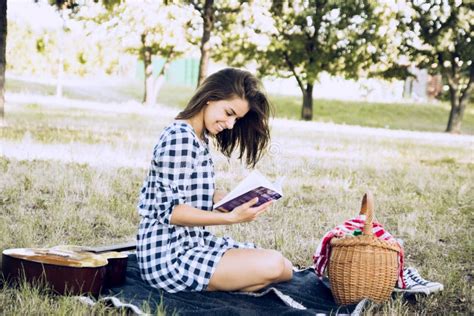 Attractive Brunette Smiles While Reading Book Stock Image Image Of Cute Beauty