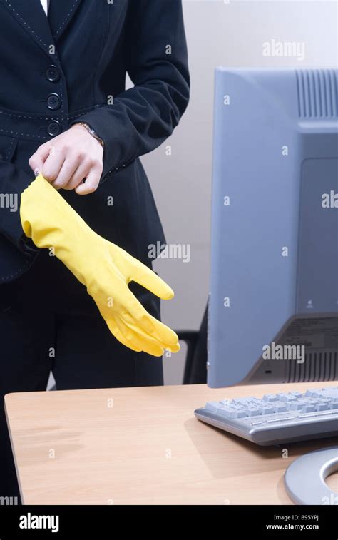 Business Woman Wearing Yellow Rubber Gloves Stock Photo Alamy