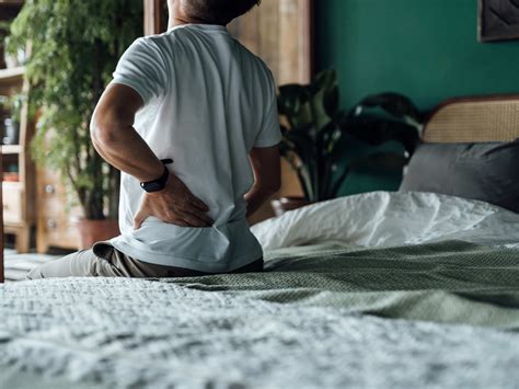 Jeff Cavaliere's Simple At-Home Exercise For Low Back Pain - Men's Fitness