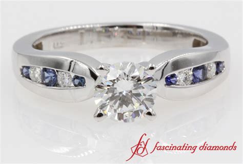 Round Cut Diamond And Sapphire Ring