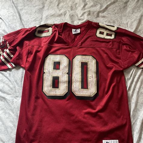 Vintage Large Jerry Rice jersey with slight fading... - Depop