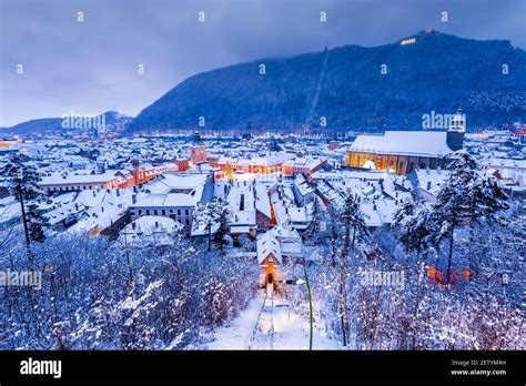 Brasov, Transylvania. Winter night scenery with Downtown and Carpathian ...