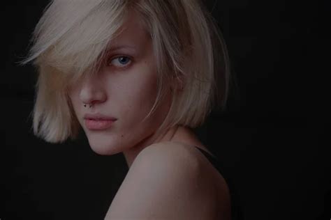 Blonde Woman Bob Hairstyle Dark Background Stock Photo By Amixstudio 201091756