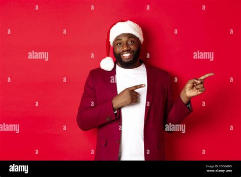 Christmas, party and holidays concept. Smiling Black man with beard and ...