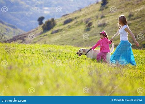 Happy Family Walking with Dog Stock Image - Image of group, family ...