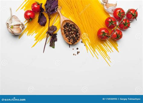 Pasta Spaghetti With Ingredients For Cooking Pasta On A White