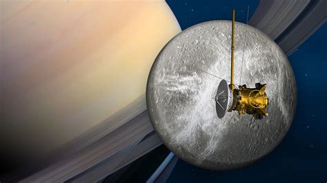 Nasa S Cassini Spacecraft Has Close Flyby Of Saturn S Moon Dione