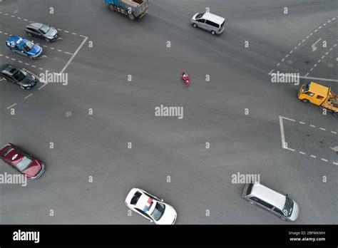 Aerial view on busy traffic intersection Stock Photo - Alamy