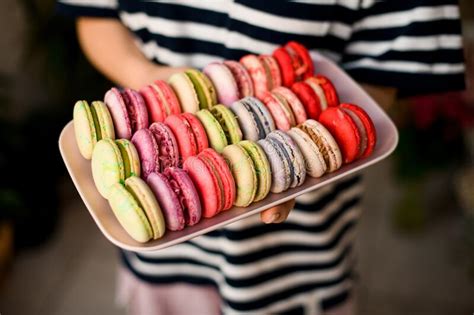 Selective Focus On Sweet Colorful Macarons Cakes Lying In Rows On Tray