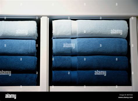 Stacks Of Fresh Towels On A Shelf Stock Photo Alamy