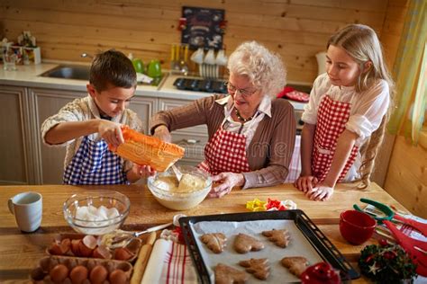 Granny Making Christmas Cookies With Kids Stock Photo Image Of Merry