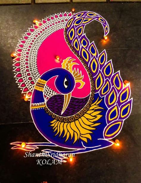 50 Admirable Peacock Rangoli designs that you can try - Wedandbeyond