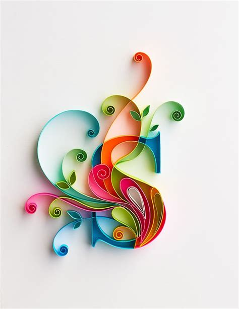 An Abstract Paper Art Piece With Swirls And Leaves