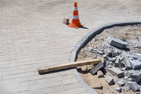 Pavement Repair And Laying Of Paving Slabs On The Walkway Stacked Tile