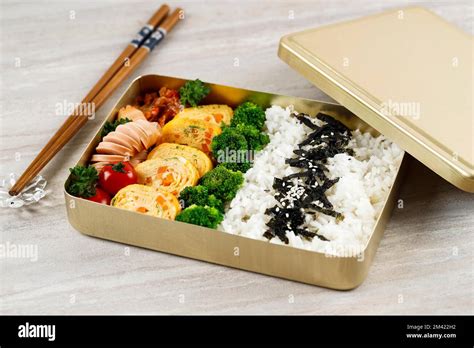 Dosirak Korean Lunchbox Contains Of Rice With Various Side Dish Egg Sausage Steam Broccoli