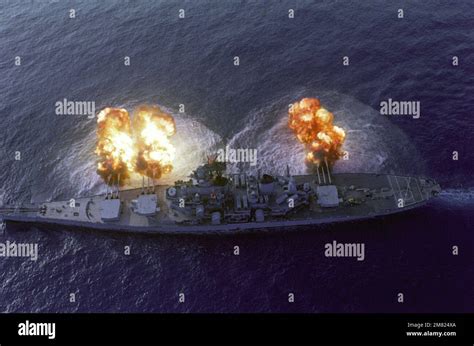 An Overhead View Of The Battleship Uss New Jersey Bb 62 Firing Its